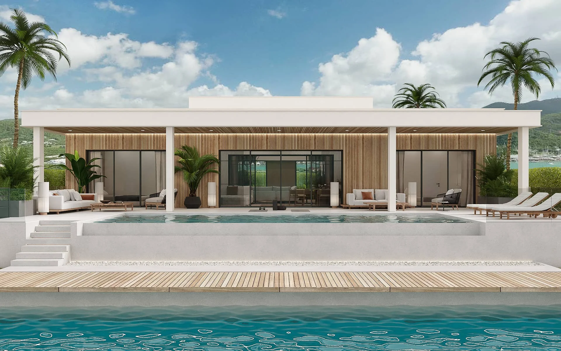 Contemporary Antigua villa with pool deck and covered terrace