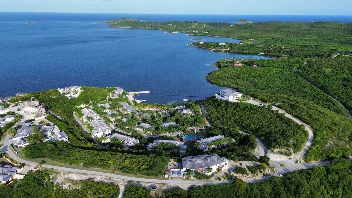 Aerial view of a residential and resort development on the Antigua coastline