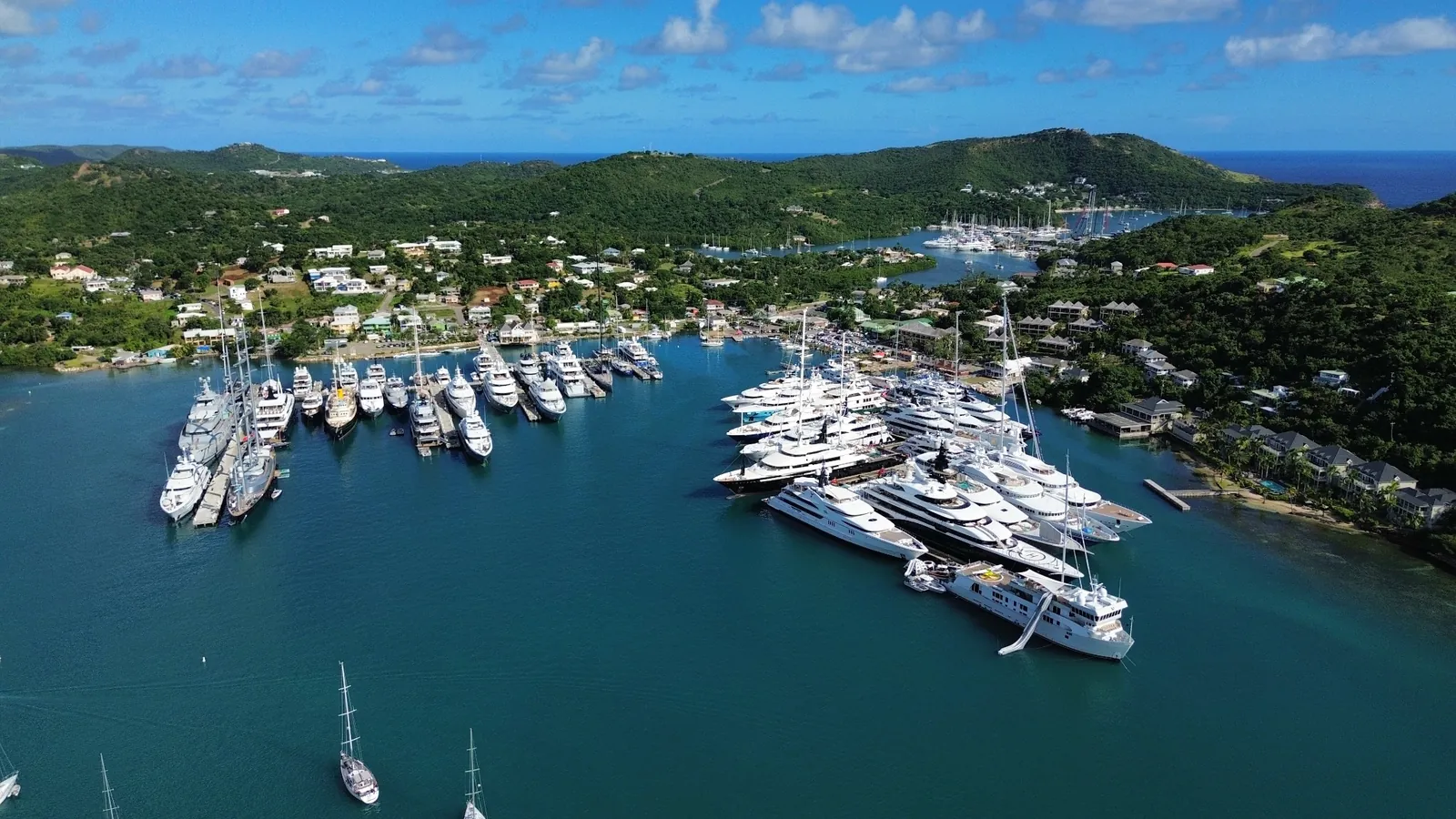 Superyachts berthed at Falmouth Harbour, Antigua, seen from the air